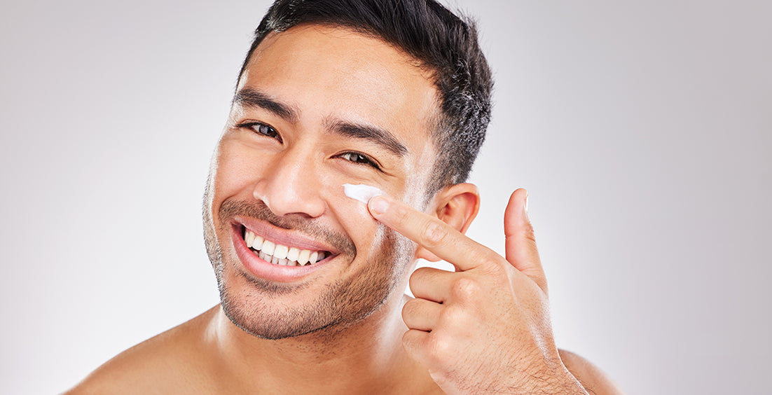 A man is applying the best collagen cream for men on face